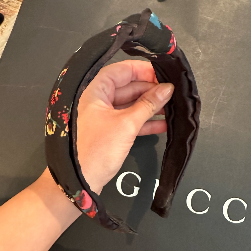 Top knot headband from Anthropologie, black with multi colored flowers